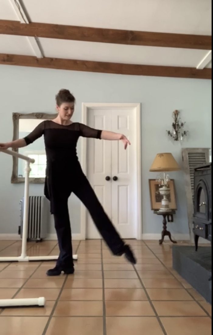 Brigid demonstrating an extension at the barre